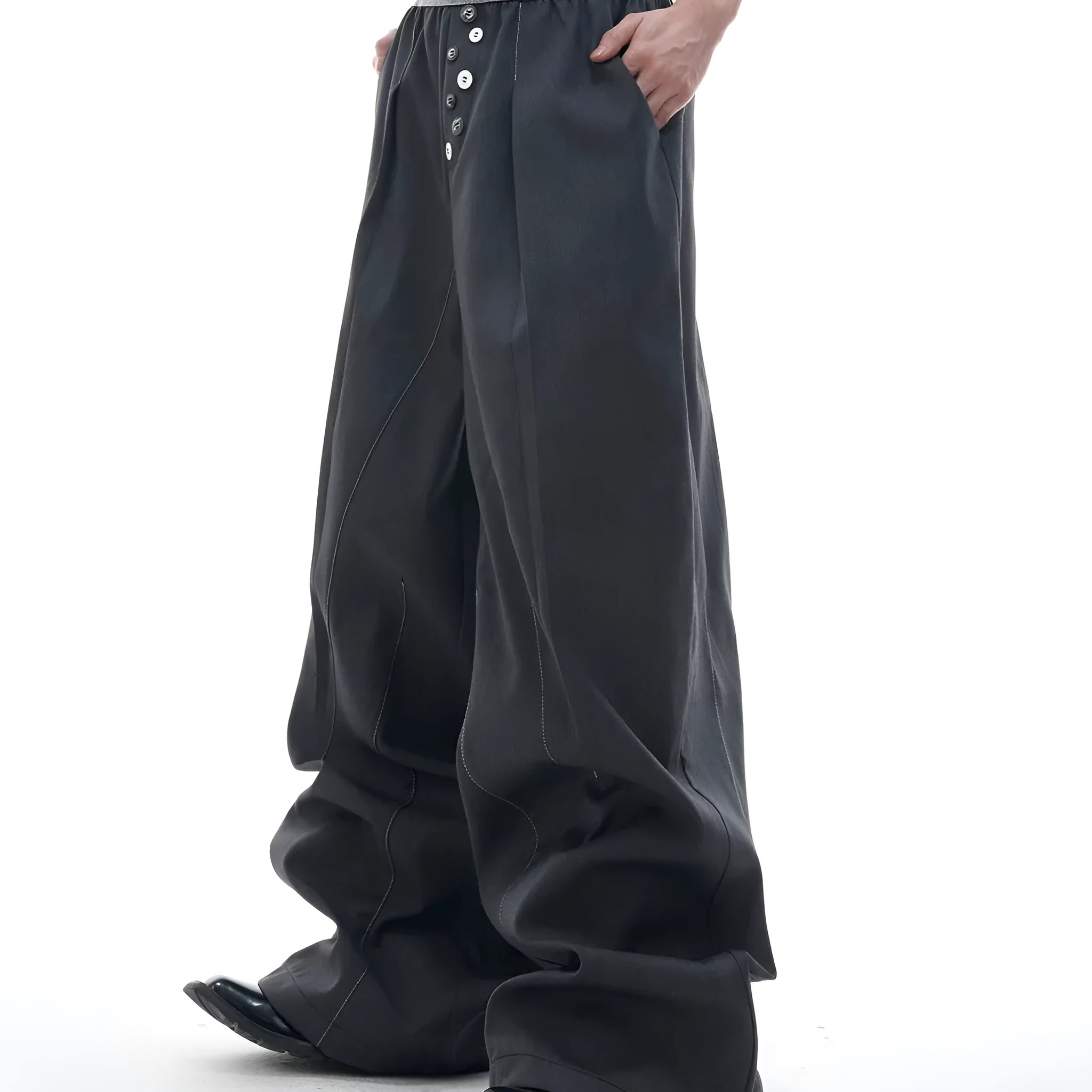 Straight-leg trousers with button-open seam design in black or grey polyester-cotton blend