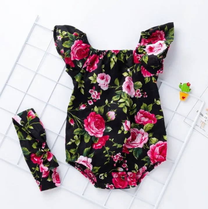 Black and white cotton baby girl romper with small flying sleeves and triangle climbing style