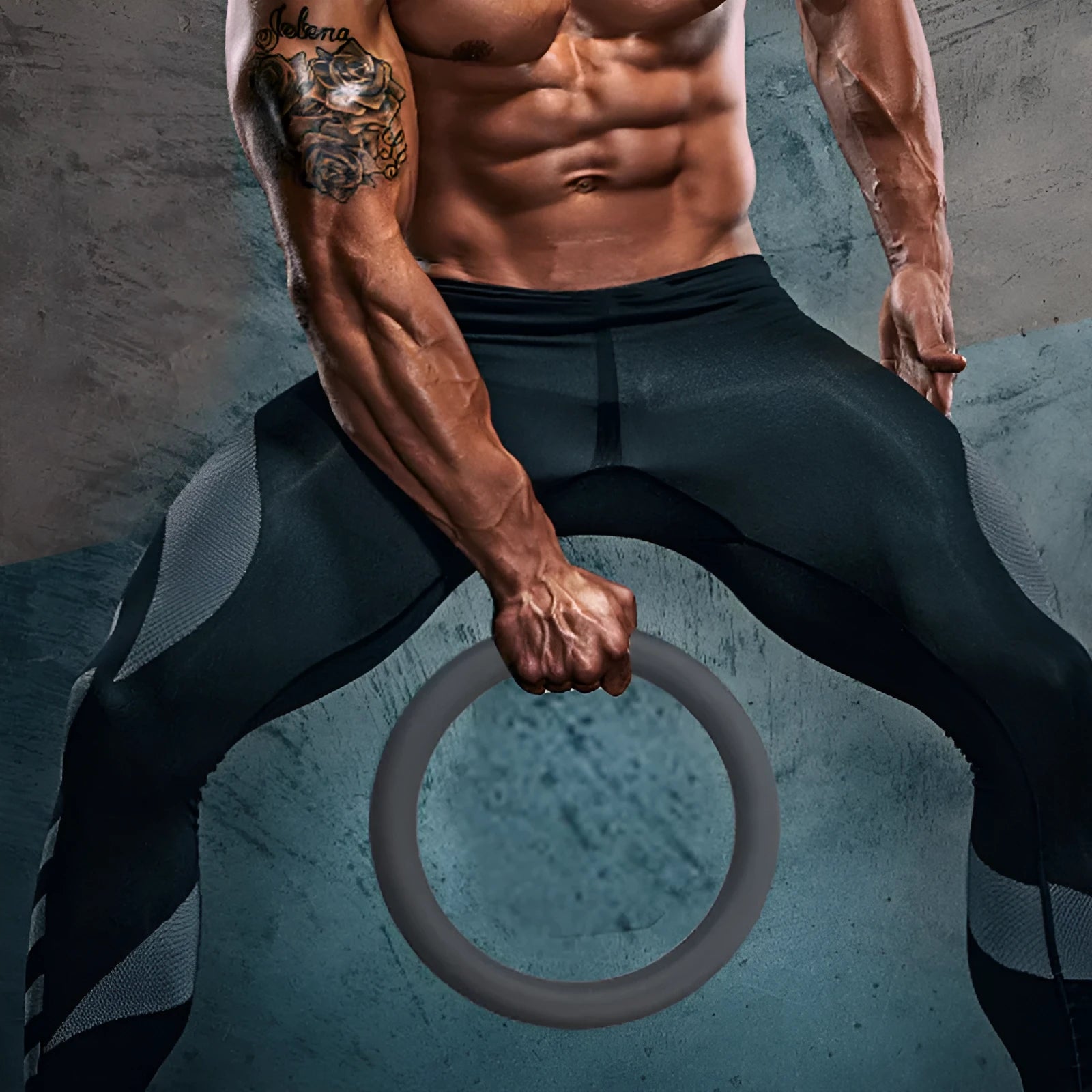 Black silicone coated iron exercise hoop 32cm diameter 4.5kg on indoor floor