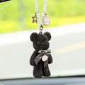 Violent Bear character car rearview mirror pendant with sparkling rhinestones on a black background.