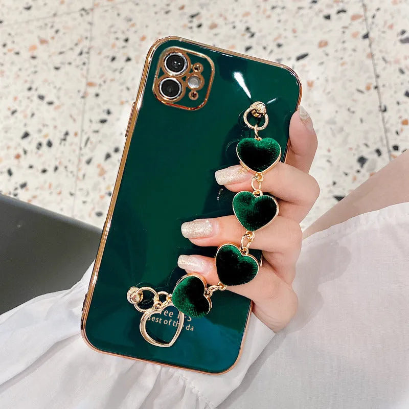 Green silicone phone case with a bracelet loop attached, compatible with Samsung and iPhone models.