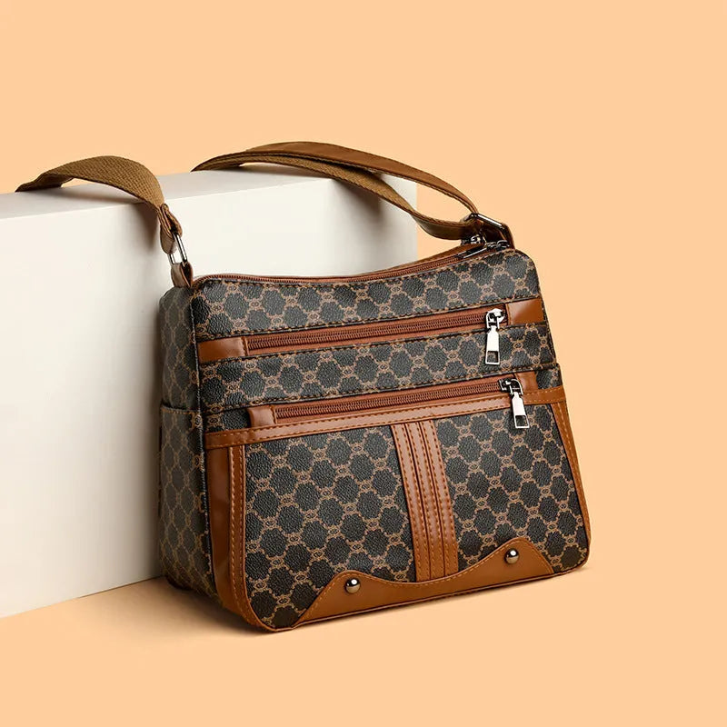 Brown women's large crossbody bag with stitching pattern on PU leather.