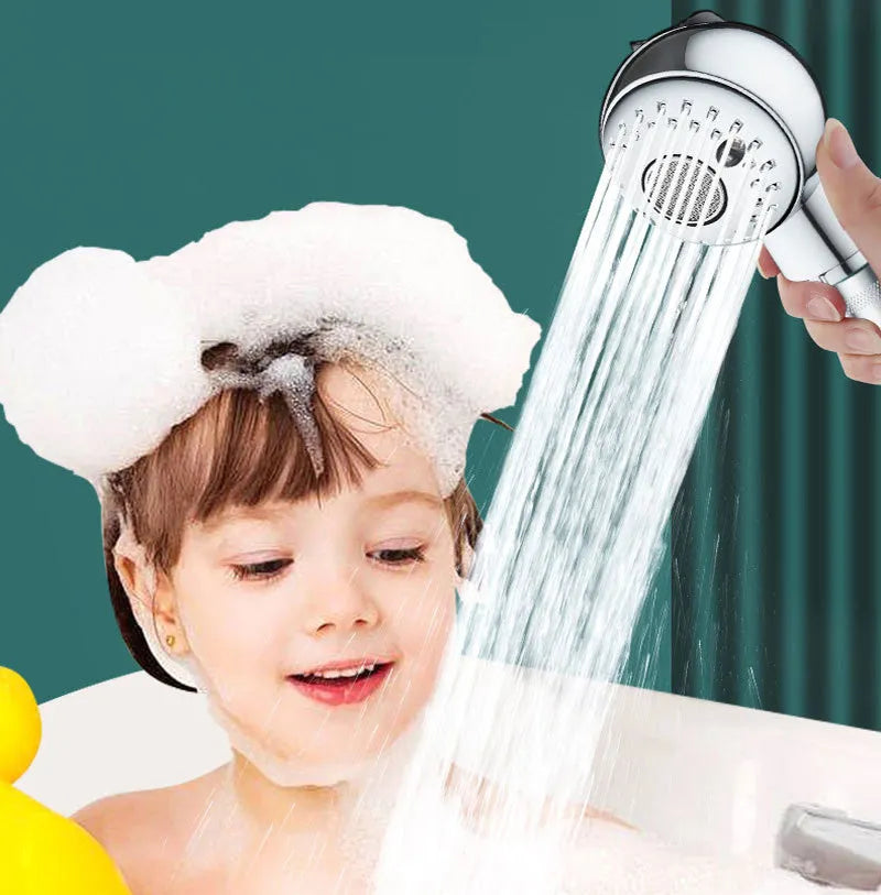Silver handheld pet shower head with gentle non-pressurised spray for washing dogs and babies.