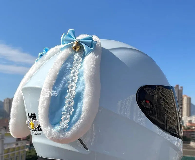 Black carbon fibre rabbit ears decoration attached to a motorcycle helmet
