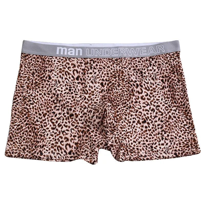 Men's loose fit leopard print underwear in milk silk polyester fabric showing mid-waist design