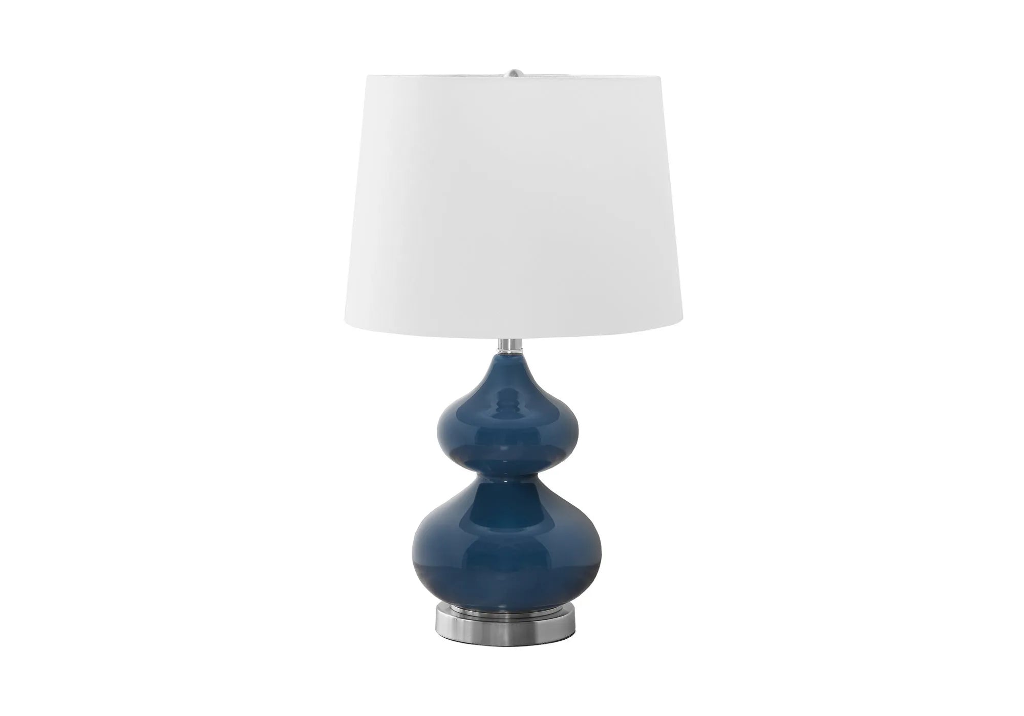 Tall crystal glass desk lamp with a blue cloth shade on a wooden desk.