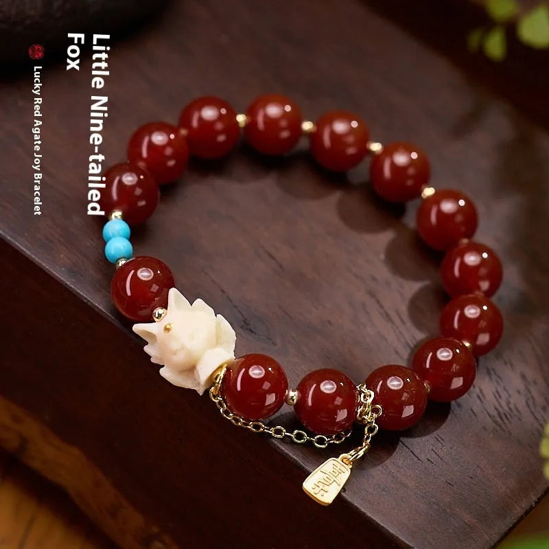 Red agate and ivory nut bracelet with 10mm beads and Fengjiu design in retro style