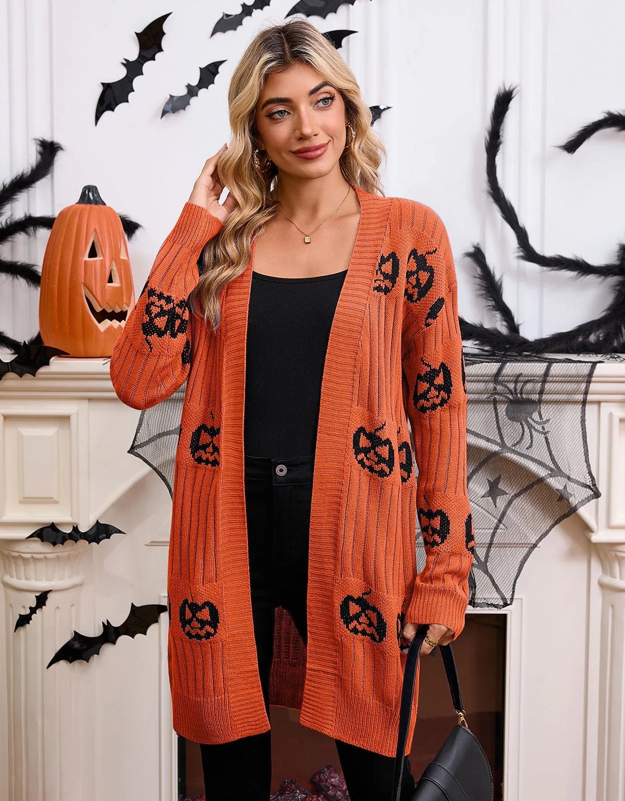 Women's black Halloween cardigan with Jacquard-knitted orange pumpkin head pattern and straight-cut design