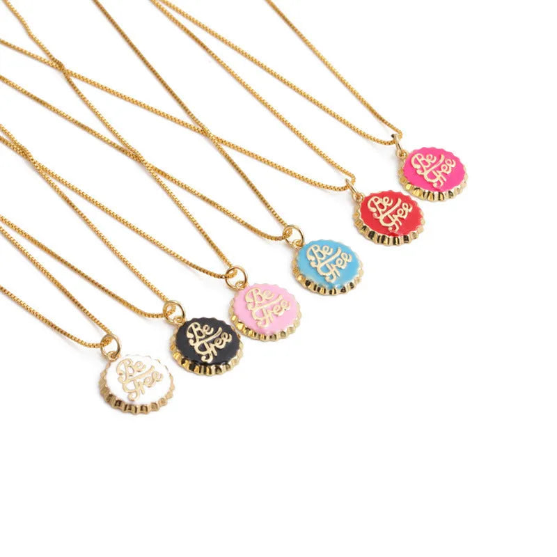 Copper Be Free bottle cap pendant necklace with a gold-plated finish on a 40cm box chain.