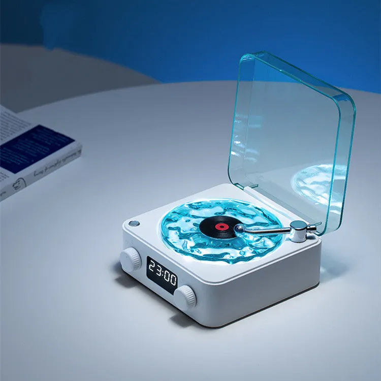 Retro Bluetooth speaker with rotating transparent turntable and RGB projection lighting effects