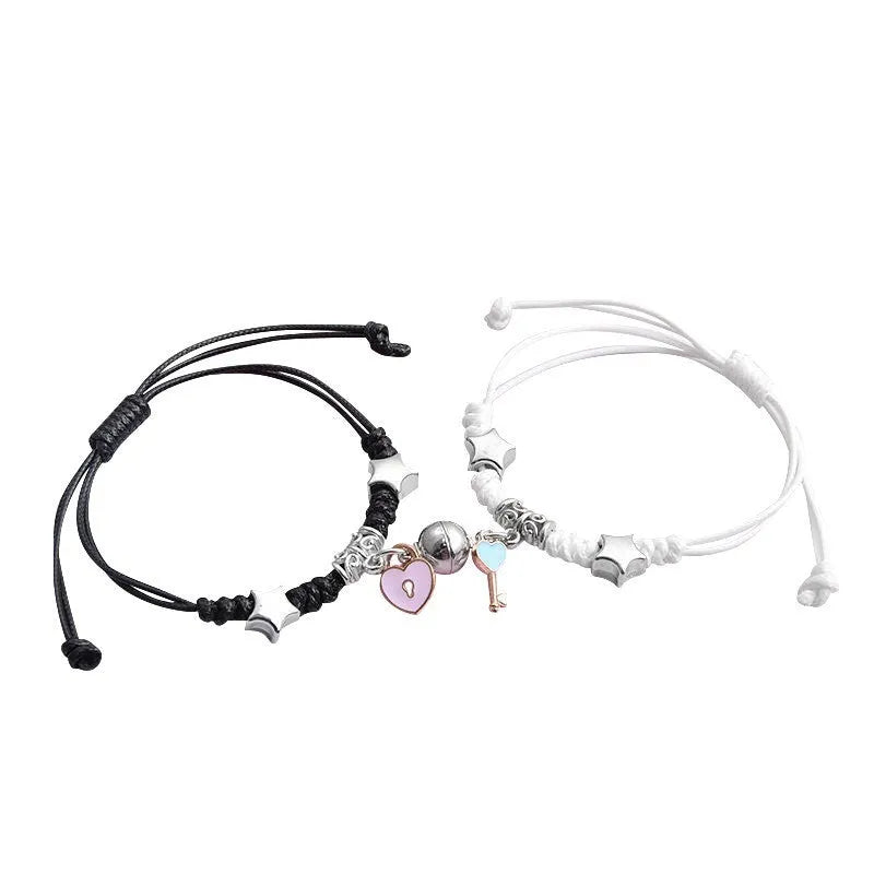 Magnetic couple bracelets with alloy electroplated finish showing multiple design styles including love locks and crown patterns