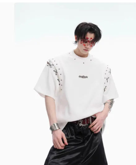 Black deconstructed short sleeve T-shirt with lace-up sides and cutout detailing on a mannequin.