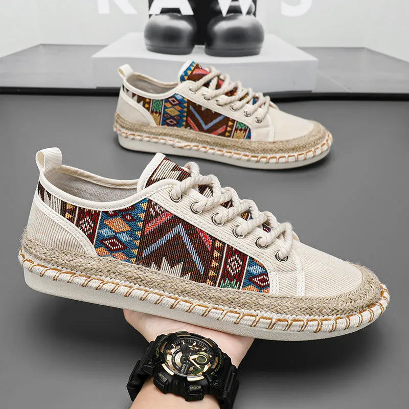 Men's beige and black cloth casual shoes with round toe and colour-block pattern, side view.