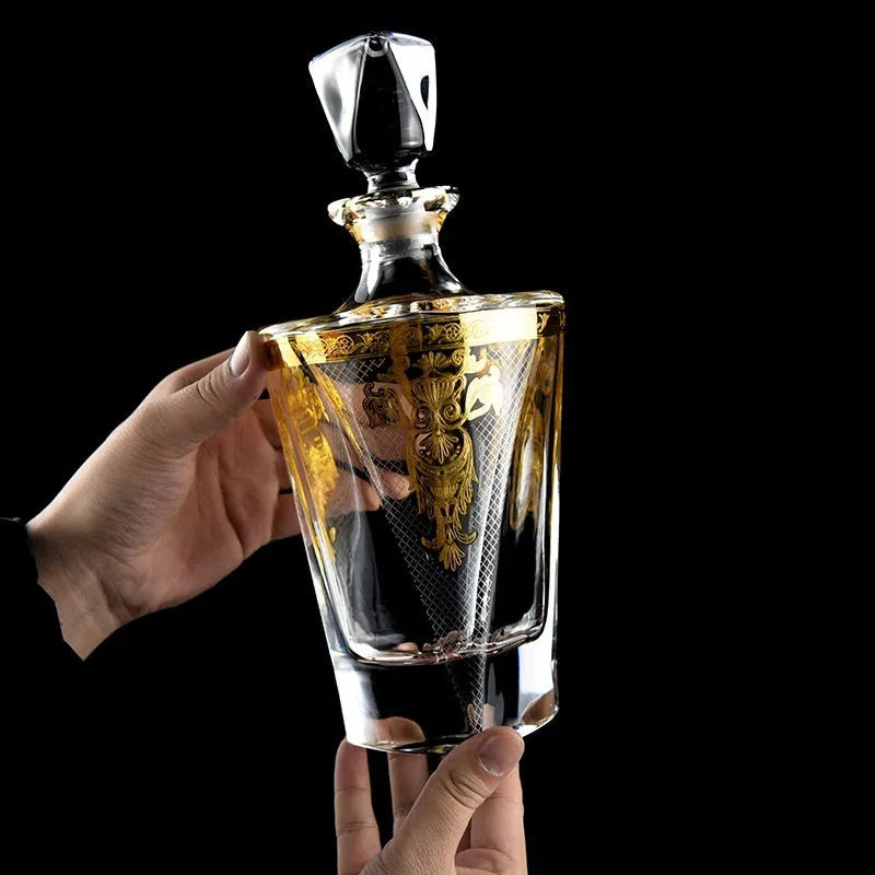 Crystal glass whisky tumbler set with gold line detailing, Nordic style, one wine bottle and six glasses on table