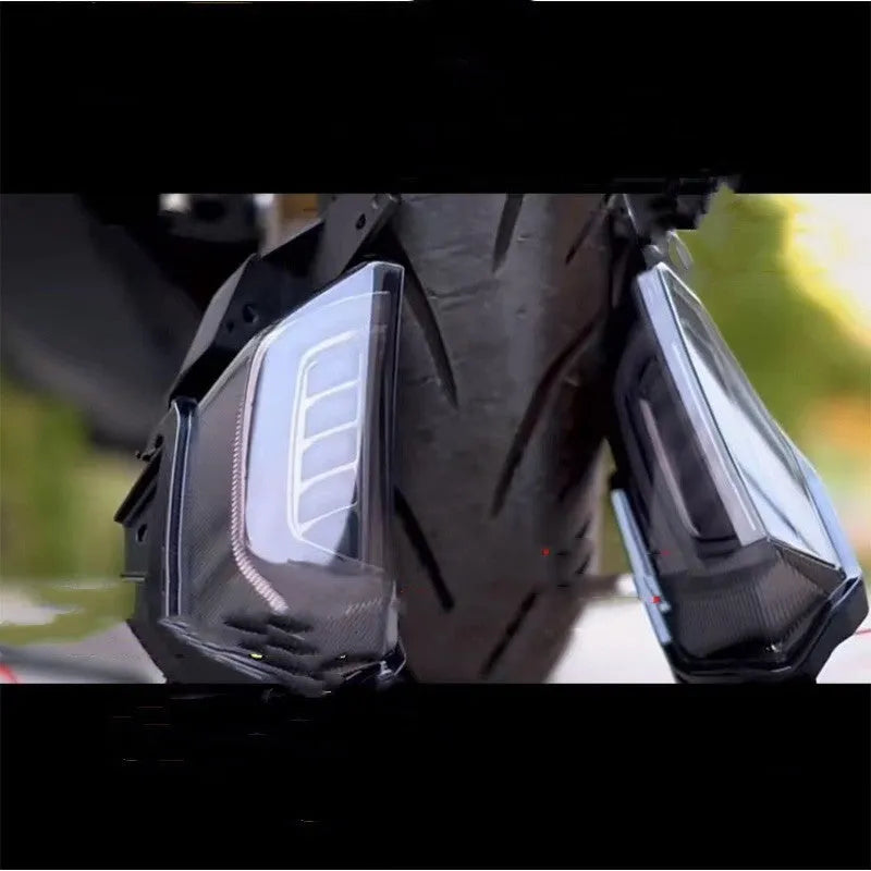 Pair of LED turn signal lights for Yamaha NMAX 155 scooter, showing colour options on a white background.