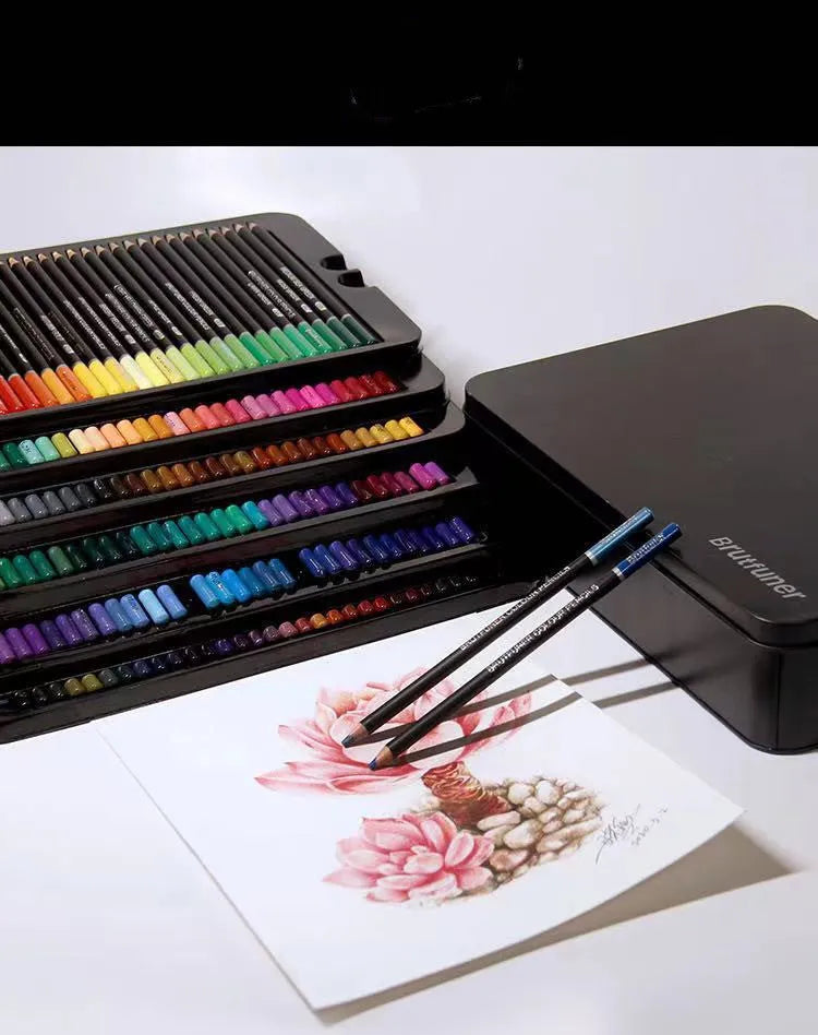 Open metal tin showing 180 colourful oily pencils with wooden casings arranged in rainbow order