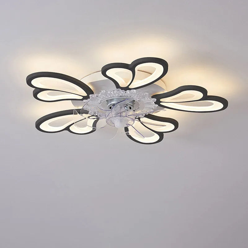Modern white ceiling fan light with six-blade design and integrated light fitting on a room ceiling.