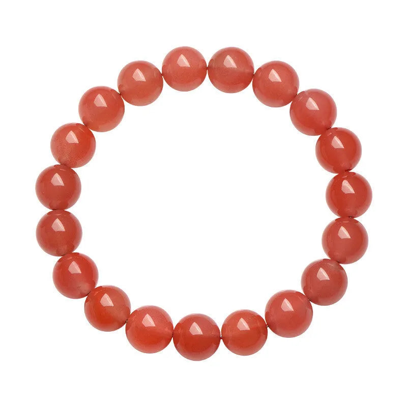 Natural cherry red agate beaded bracelet with high-polish stones on a wrist, showing single and three-strand style options.