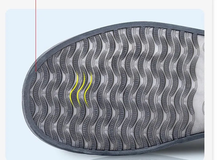 White high-top PVC reusable waterproof shoe covers for women on a wet surface.