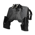 Black plug-in mobile phone gamepad with ergonomic handles and adjustable clamp holding a smartphone
