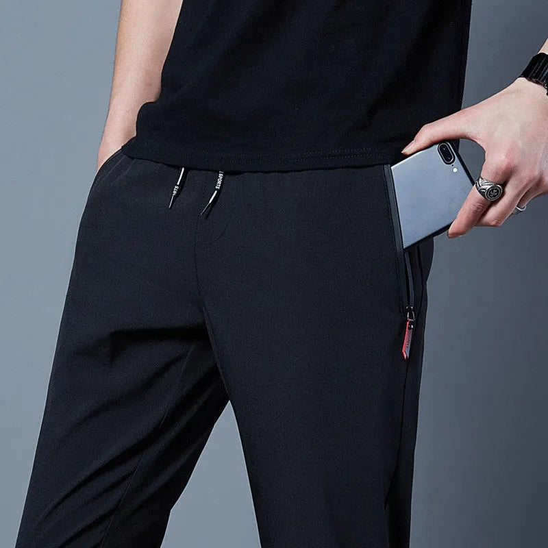 Men's solid colour loose casual pants in grey, black, blue polyester