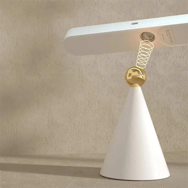 Geometric design desk lamp with magnetic base for wall mounting in white or khaki colour