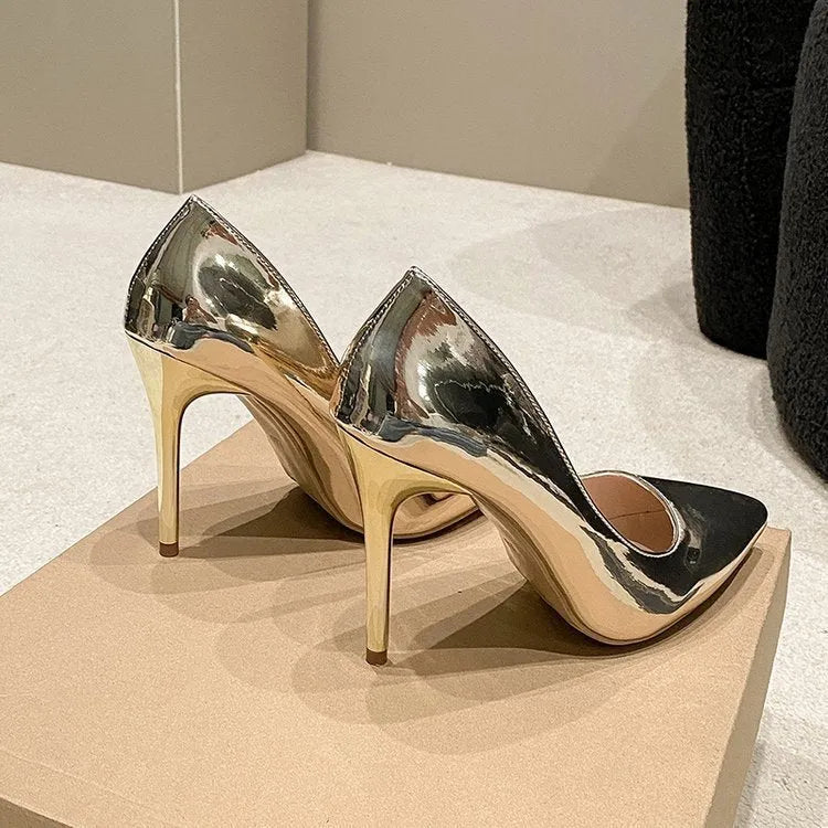 Women's pointed toe stiletto heel pumps in gold and silver colours with slip-on design