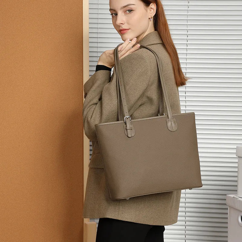 Genuine leather women's tote bag in horizontal square shape showing internal organisers and sandwich pocket