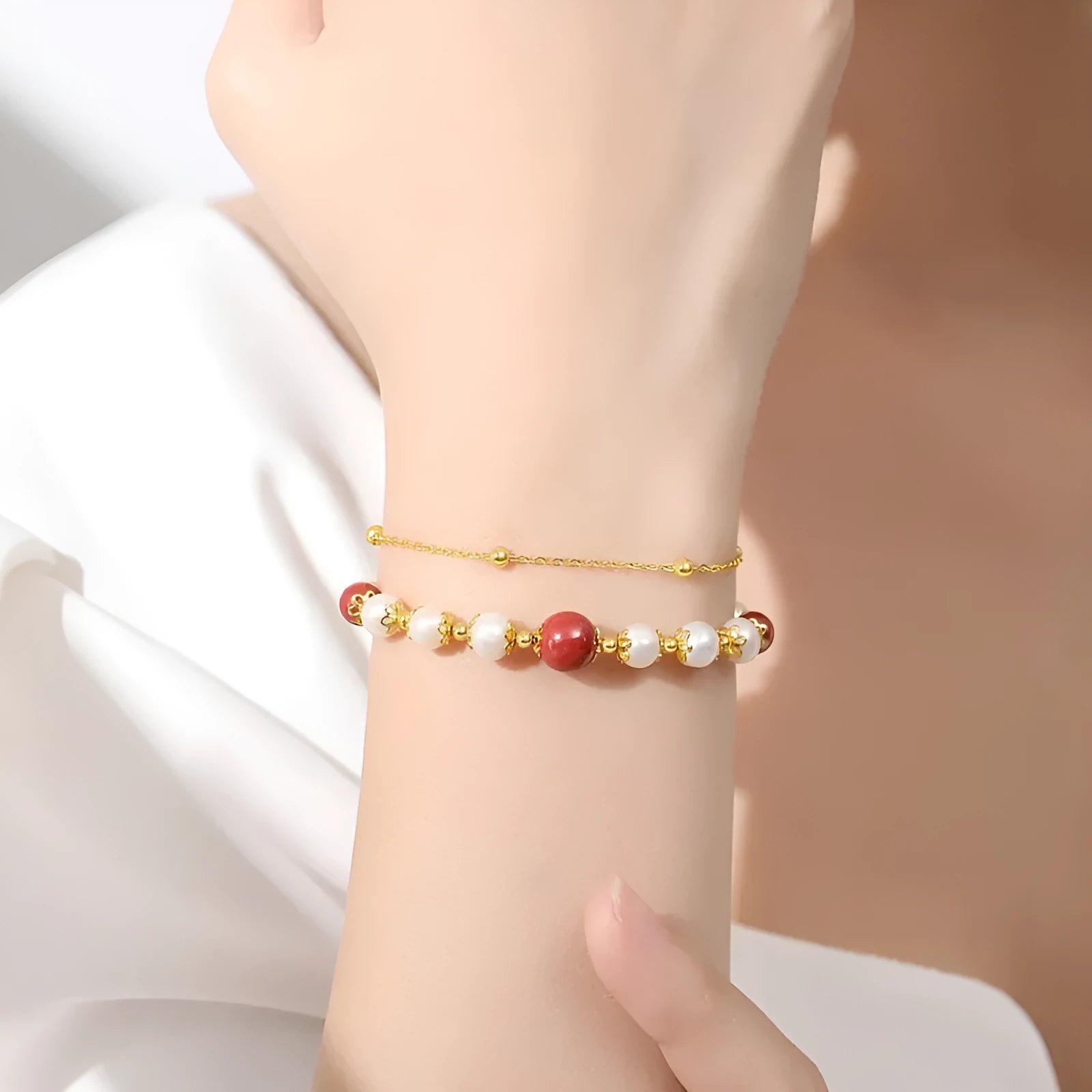 Sterling silver double-layer bracelet with freshwater pearls and red bean charms