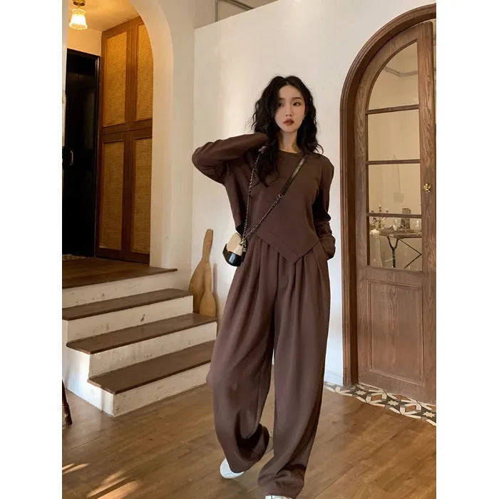 Women's khaki loose-fit casual sports suit with long sleeves and full-length trousers.