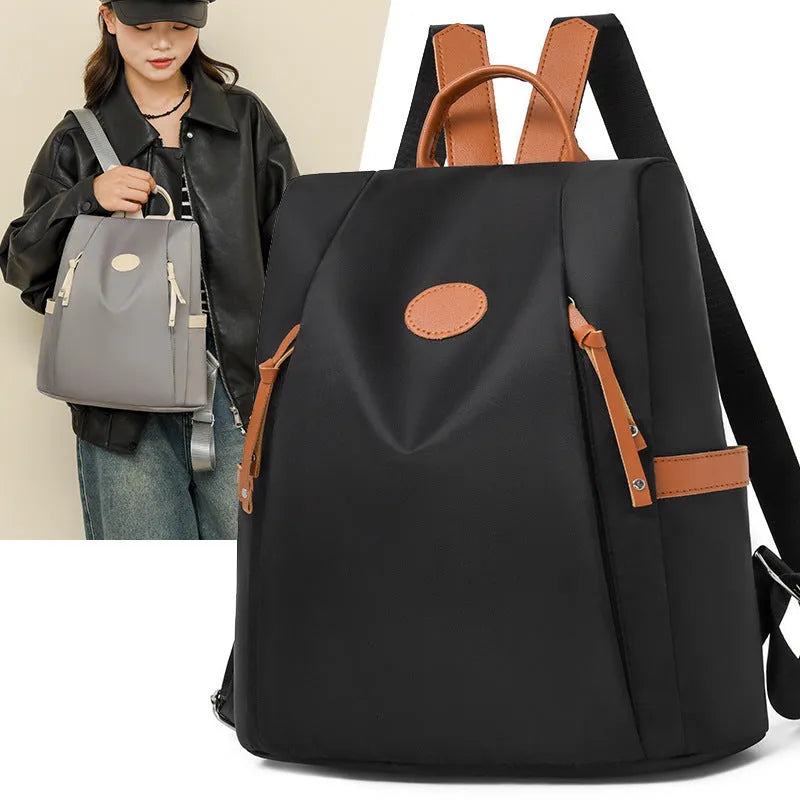 Waterproof Oxford cloth anti-theft travel backpack in urban simplicity style, available in multiple colours