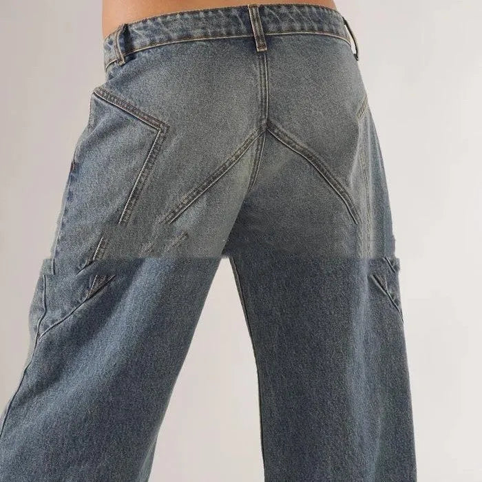 Women's blue cotton wide leg mop trousers with low waist and spliced stitching detail.