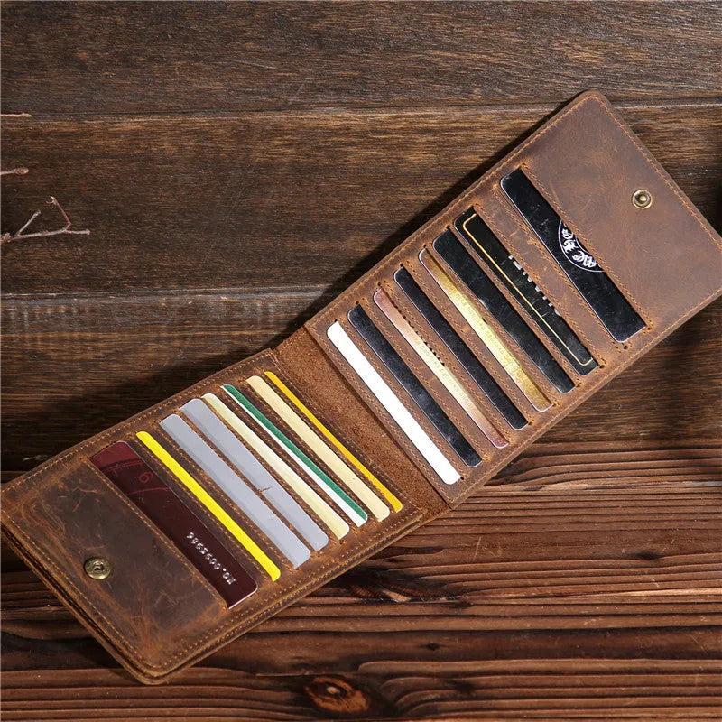 Men's slim leather card holder wallet with multiple card slots and a mobile phone pocket.