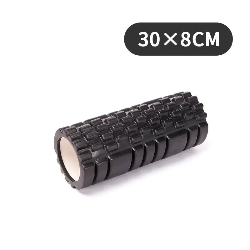 A solid EVA foam roller for fitness, shown in a selection of colours including black, pink, and blue.