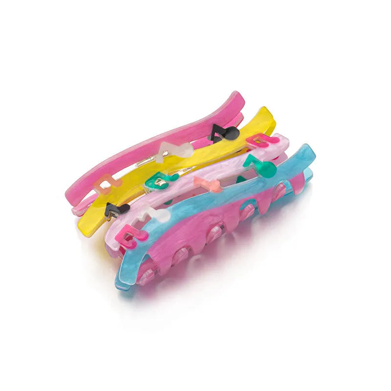 Acrylic candy color wave mixed colour notes hair grip with irregular shape on a background