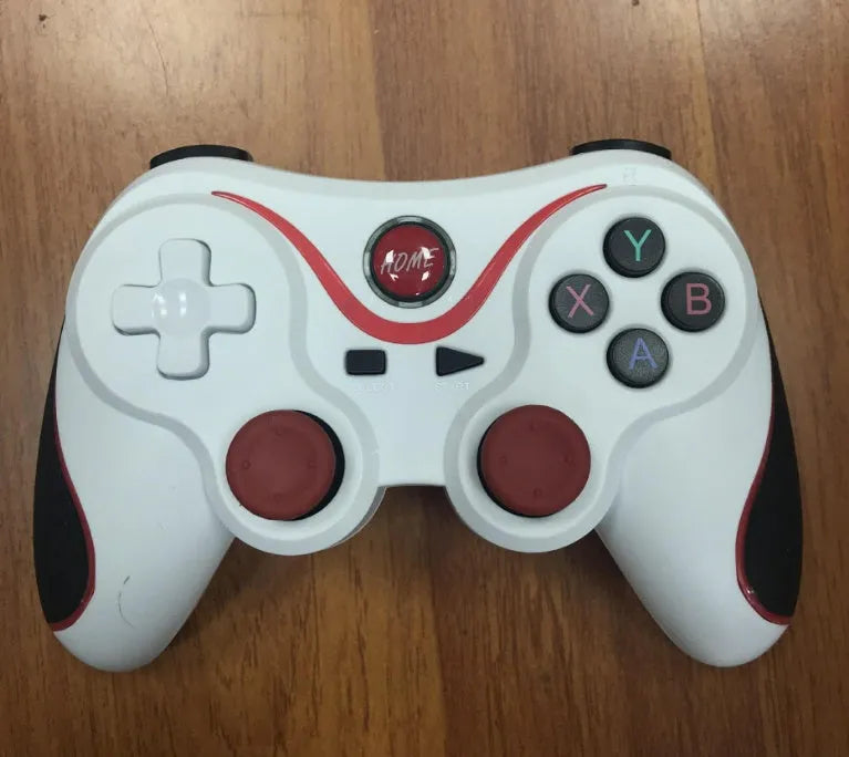 Black and white X3 version wireless Bluetooth game controller for Android phones with mobile phone clip.