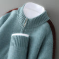 Slim-fit half-zip sheep wool sweater in grey, shown on a hanger.