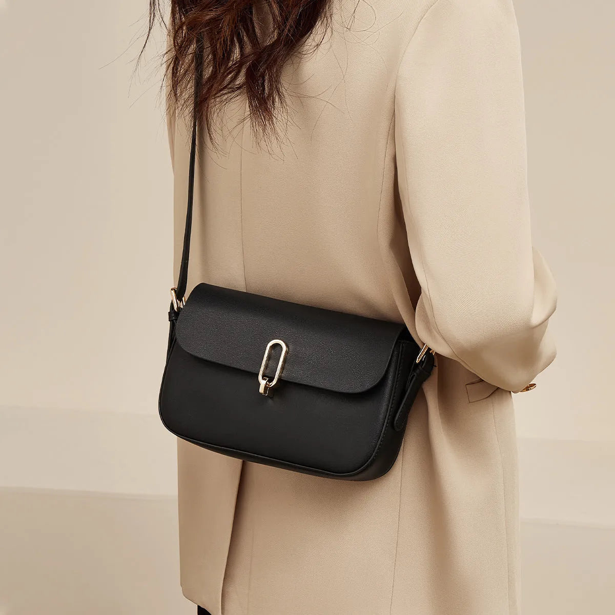Black and brown genuine cowhide leather square shoulder messenger bag with a lock and internal zippers
