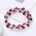 Women's three-ring bracelet with tourmaline, strawberry quartz and amethyst gemstones on adjustable cord