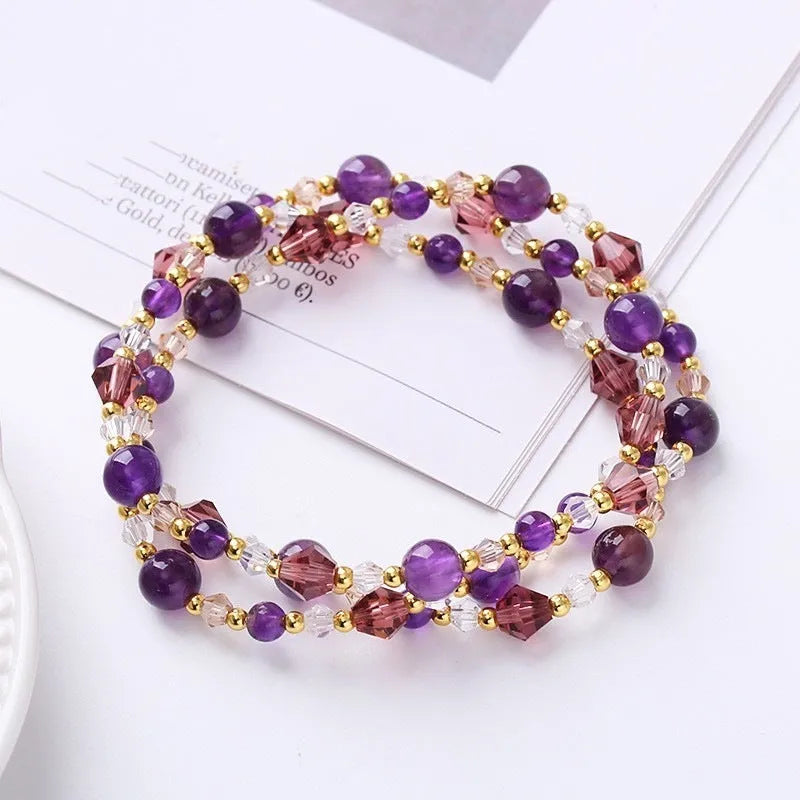 Women's three-ring bracelet with tourmaline, strawberry quartz and amethyst gemstones on adjustable cord