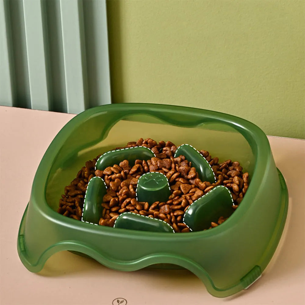 Blue plastic dog slow feeder anti-choking bowl on a white background.