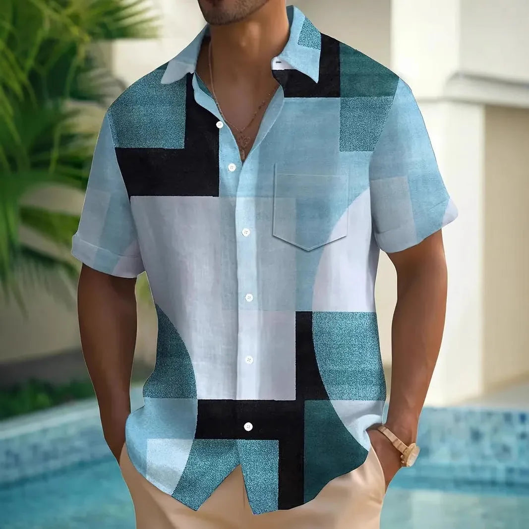 Man wearing a loose-fit short sleeve cardigan shirt with a blue and white geometric 3D print pattern.