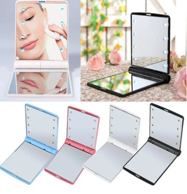Folding LED pocket cosmetic mirror in black with built-in light, closed position