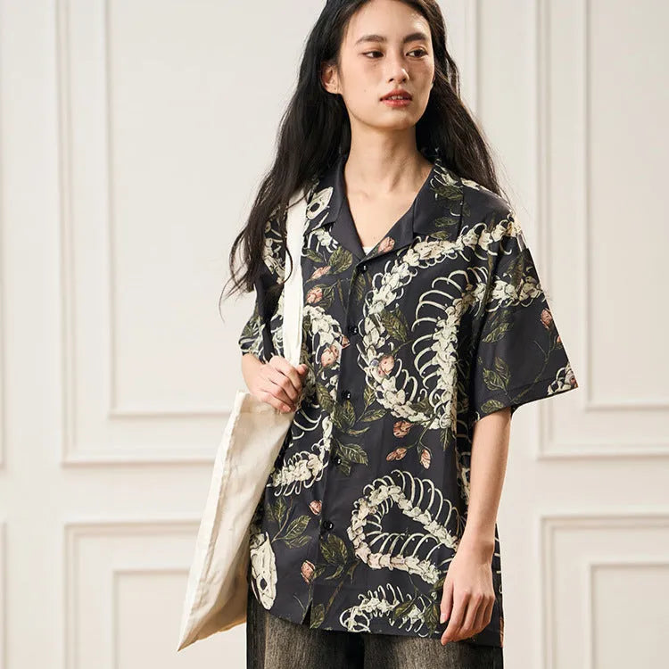Men's loose-fit Cuban collar shirt with a snake bone floral pattern on short sleeves.