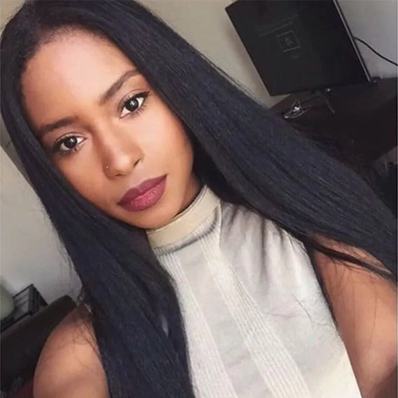 Long straight synthetic wig for women with centre-parted bangs in black colour.