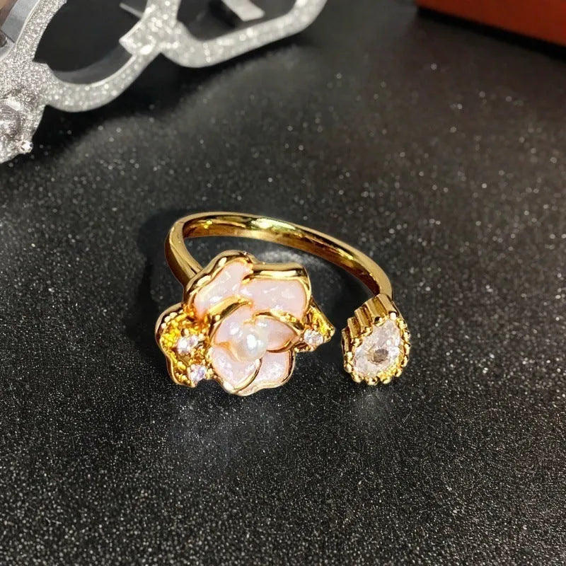 Close-up of a copper adjustable gourd ring with vintage oil-dripping finish and inlaid zircon stone.
