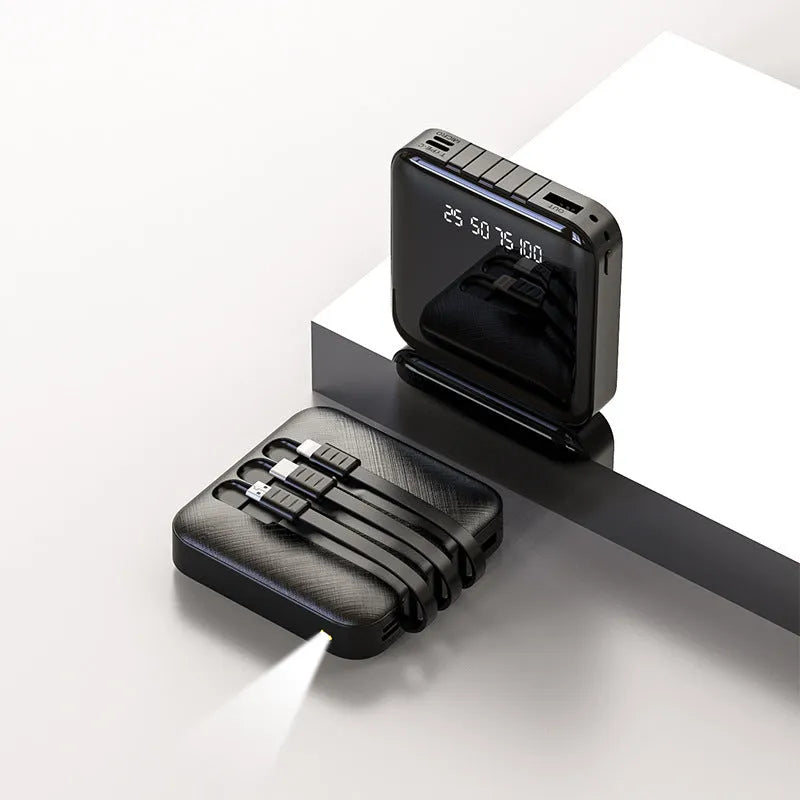 Mirror-finished black power bank with built-in USB cable showing compact 80x80mm size