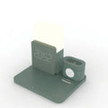 A dark green 3-in-1 Qi wireless charging stand holding a smartphone.