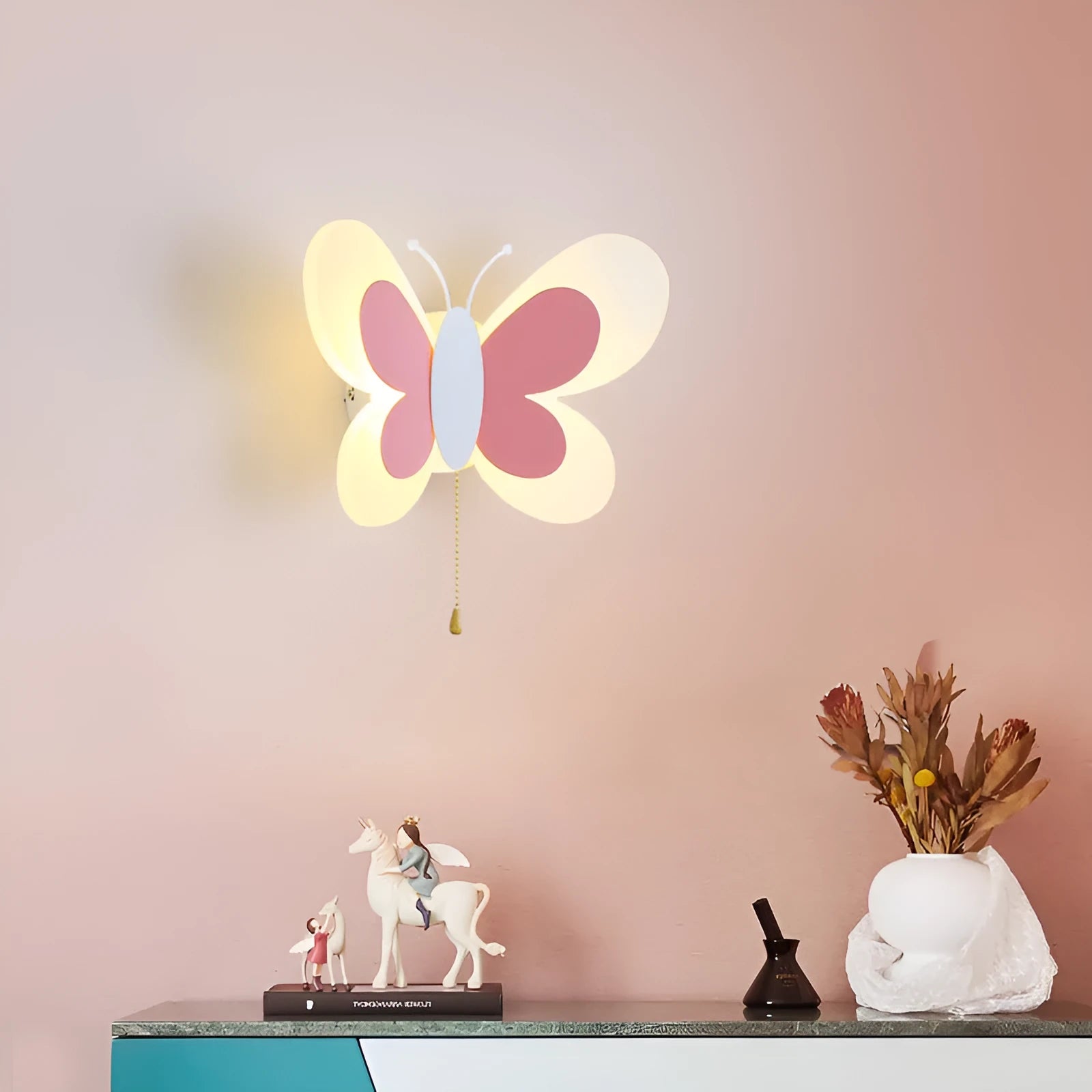 Butterfly-shaped acrylic children bedroom wall lamp in white and pink, 240x170x105mm