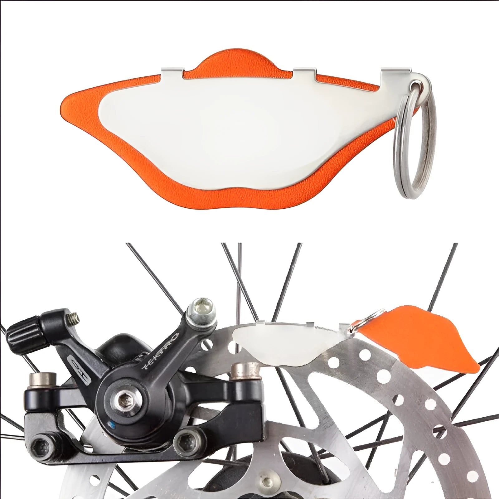 Mountain bike scratch-proof disc brake pads in black and orange colours with adjustment flap.